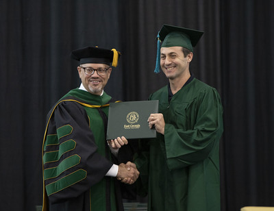 Dr. Schecter with graduate